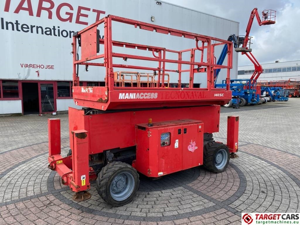 Manitou 140SC Diesel 4x4 Scissor Work Lift 1412cm - Ножничный подъемник: фото 1 Manitou 140SC Diesel 4x4 Scissor Work Lift 1412cm - Ножничный подъемник: фото 1
