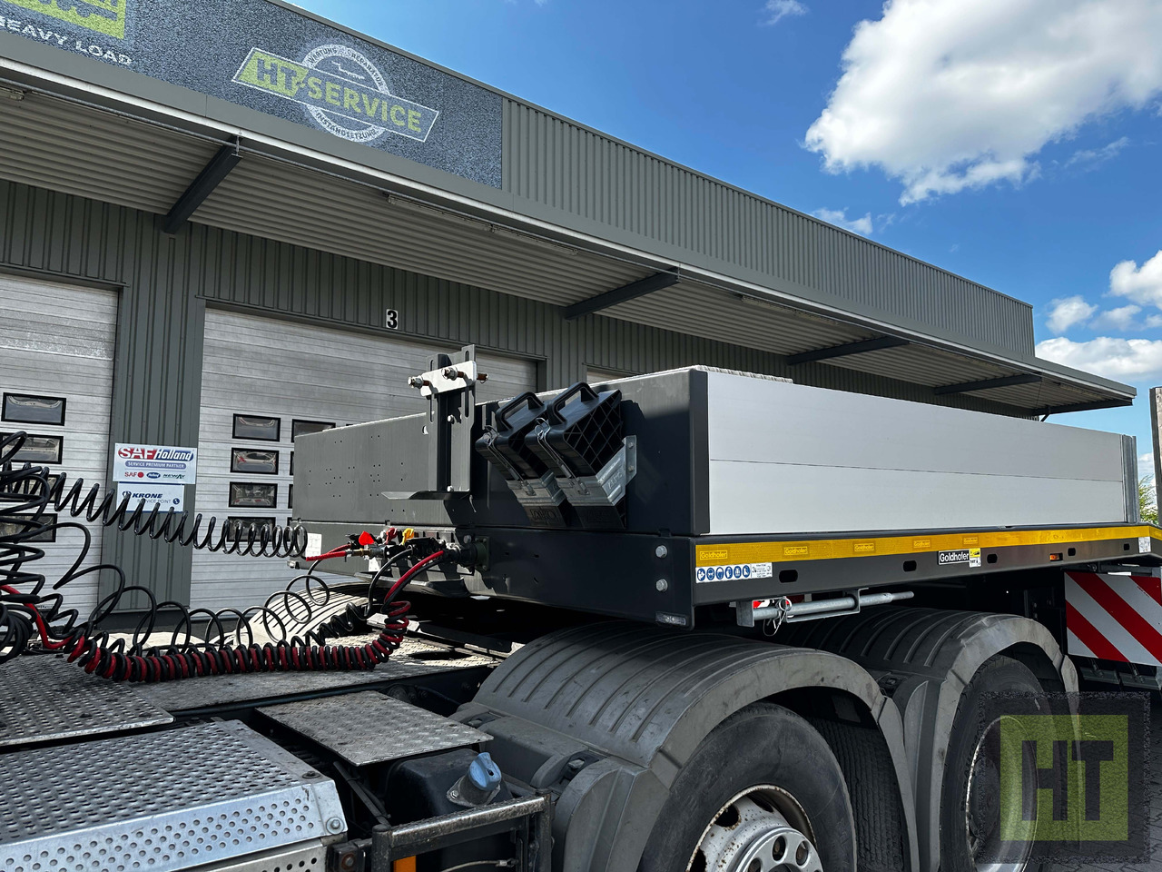 Goldhofer 4-Achs-Tele-Semi mit hydr. Doppelklapprampen - Низкорамный полуприцеп: фото 2 Goldhofer 4-Achs-Tele-Semi mit hydr. Doppelklapprampen - Низкорамный полуприцеп: фото 2