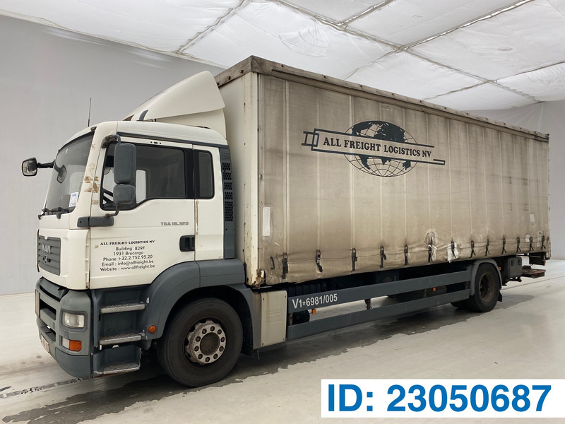 MAN TGA 18.320 - Тентованный грузовик: фото 1 MAN TGA 18.320 - Тентованный грузовик: фото 1