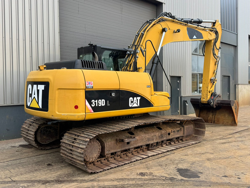 Caterpillar 319DL - Гусеничный экскаватор: фото 5 Caterpillar 319DL - Гусеничный экскаватор: фото 5