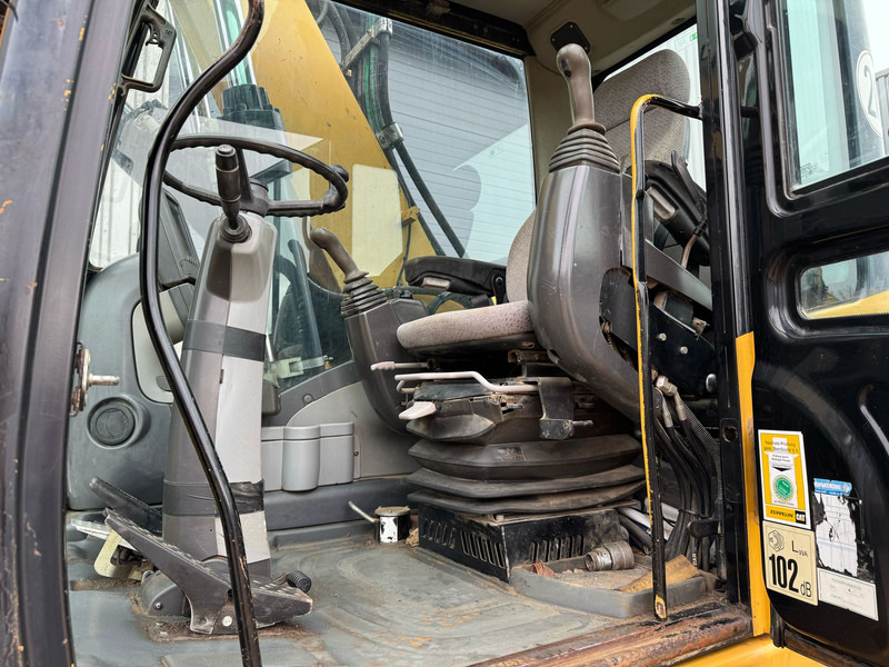 Колёсный экскаватор Caterpillar M315D: фото 20