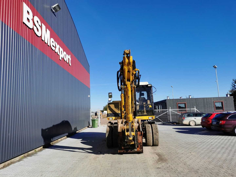 Caterpillar M315 wheel excavator - Колёсный экскаватор: фото 3 Caterpillar M315 wheel excavator - Колёсный экскаватор: фото 3