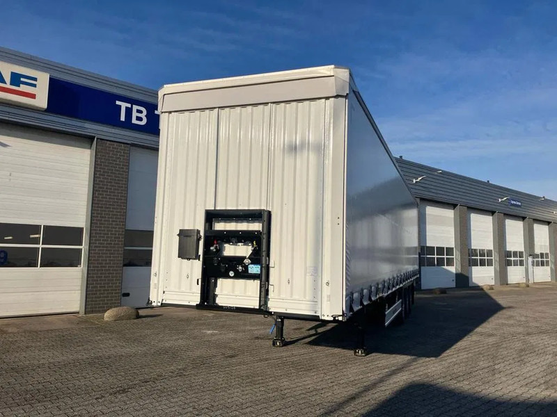 Kässbohrer SCS X / 90 - 12 / 27 Schuifzeilen met twee liftassen en hefdak 500mm - Тентованный полуприцеп: фото 3 Kässbohrer SCS X / 90 - 12 / 27 Schuifzeilen met twee liftassen en hefdak 500mm - Тентованный полуприцеп: фото 3