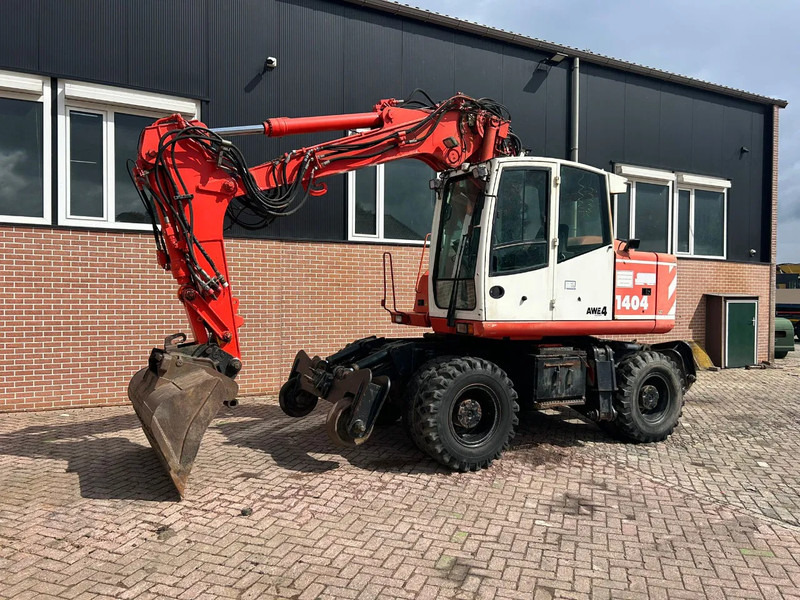 Atlas 1404 - Колёсный экскаватор: фото 1 Atlas 1404 - Колёсный экскаватор: фото 1