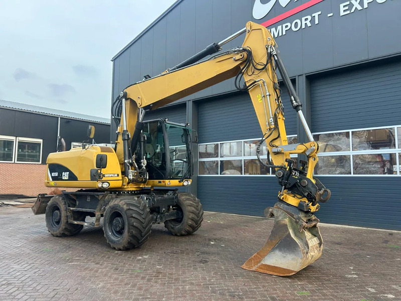 Caterpillar M315D - Колёсный экскаватор: фото 2 Caterpillar M315D - Колёсный экскаватор: фото 2