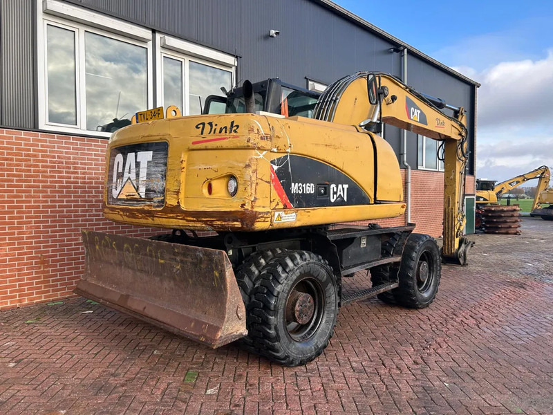 Caterpillar M316D - Колёсный экскаватор: фото 2 Caterpillar M316D - Колёсный экскаватор: фото 2