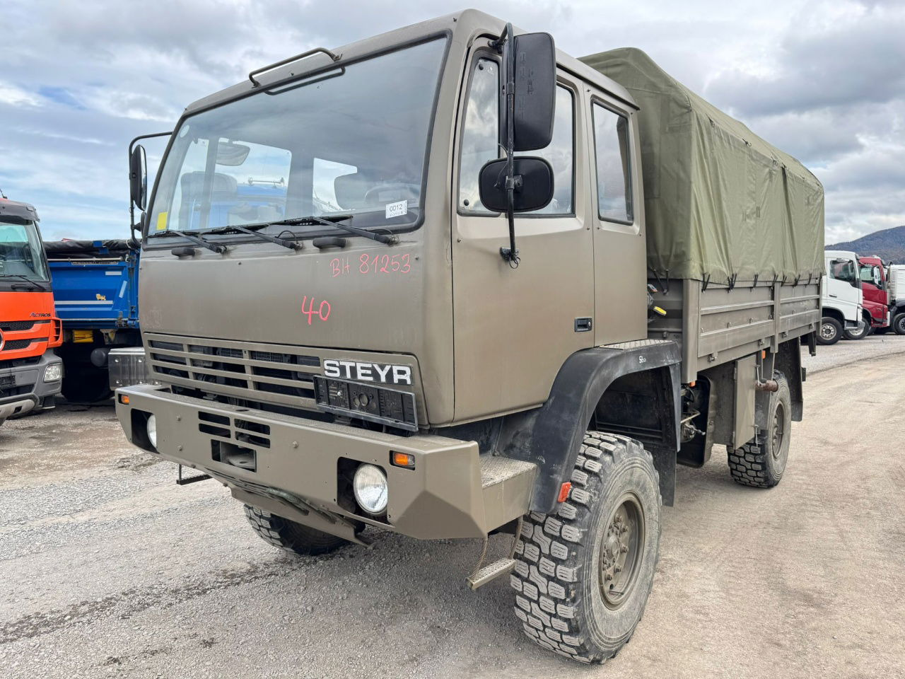 Steyr 12M18 4X4 stake body - truck - Тентованный грузовик: фото 1 Steyr 12M18 4X4 stake body - truck - Тентованный грузовик: фото 1