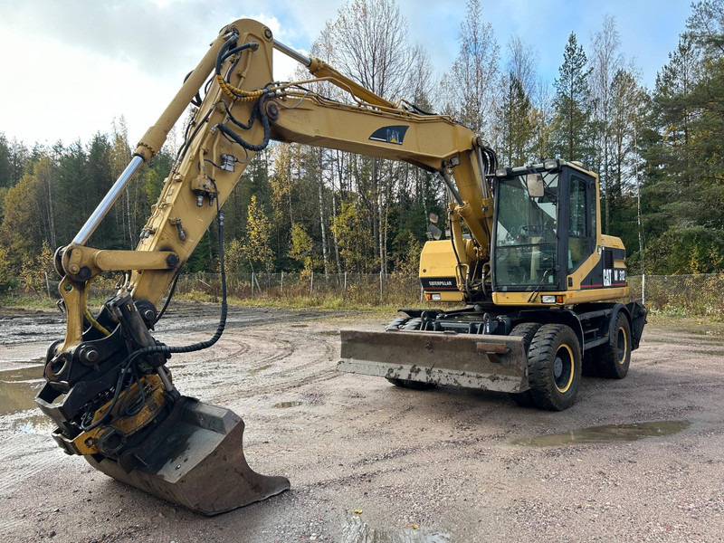 Caterpillar M312 Engcon EC20 tiltrotator - Колёсный экскаватор: фото 1 Caterpillar M312 Engcon EC20 tiltrotator - Колёсный экскаватор: фото 1