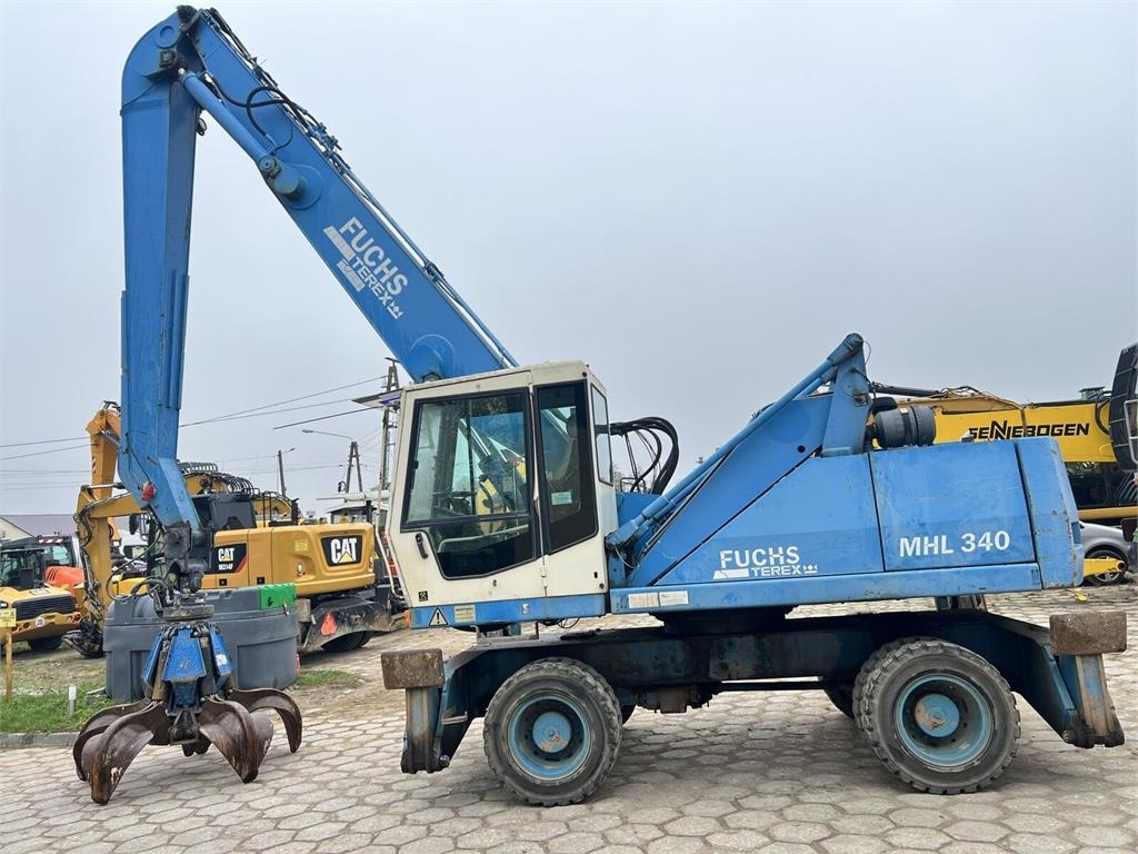 Fuchs MHL340 - Перегружатель: фото 1 Fuchs MHL340 - Перегружатель: фото 1