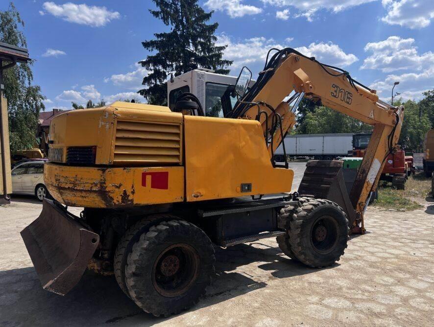 Liebherr A316 - Колёсный экскаватор: фото 5 Liebherr A316 - Колёсный экскаватор: фото 5