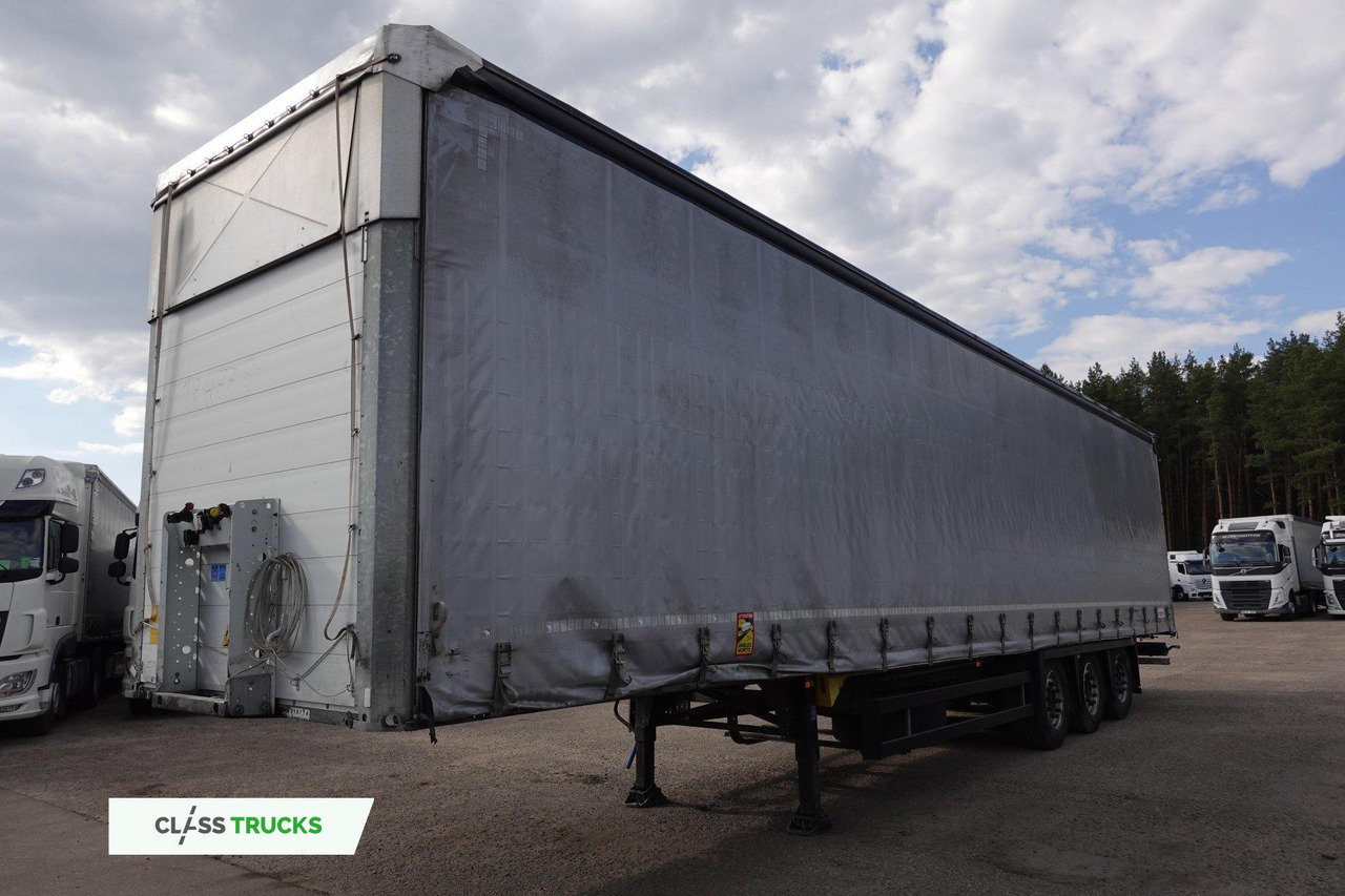 Schmitz Cargobull SCS24/L Varios - Тентованный полуприцеп: фото 1 Schmitz Cargobull SCS24/L Varios - Тентованный полуприцеп: фото 1