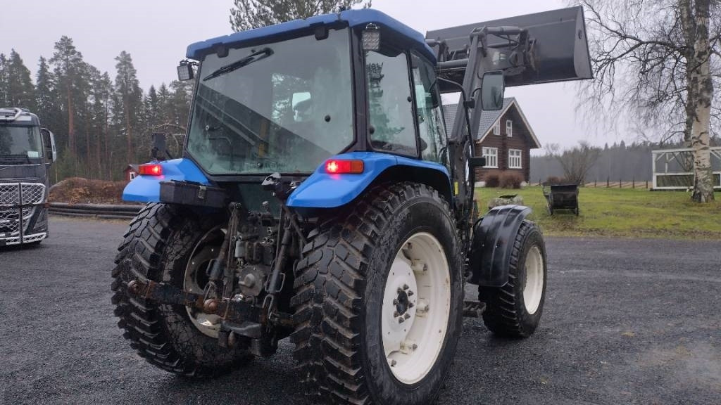 New Holland TL90 trima kuormaaja, sähköinen suunnanvaihtaja - Трактор: фото 5 New Holland TL90 trima kuormaaja, sähköinen suunnanvaihtaja - Трактор: фото 5