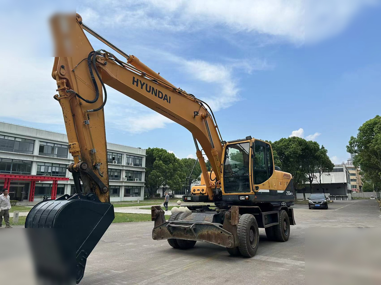 HYUNDAI ROBEX 210W-9 - Колёсный экскаватор: фото 1 HYUNDAI ROBEX 210W-9 - Колёсный экскаватор: фото 1