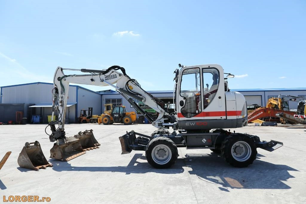 Wacker Neuson EW 100 - Колёсный экскаватор: фото 1 Wacker Neuson EW 100 - Колёсный экскаватор: фото 1