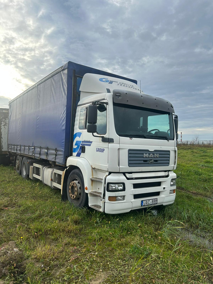 MAN TGA 26.310 - Тентованный грузовик: фото 1 MAN TGA 26.310 - Тентованный грузовик: фото 1