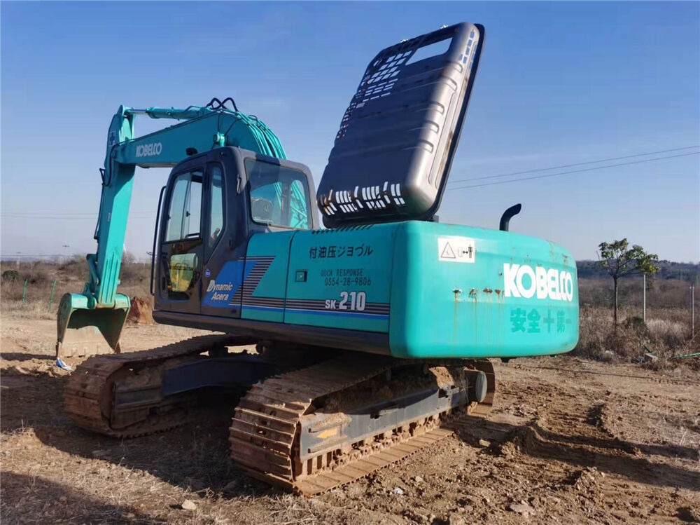 Kobelco SK210 - Гусеничный экскаватор: фото 4 Kobelco SK210 - Гусеничный экскаватор: фото 4