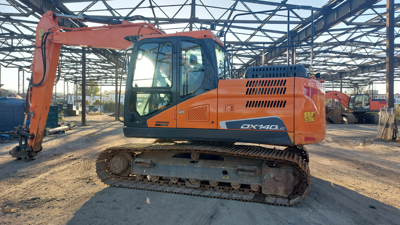 DOOSAN DX140LC-5 - Гусеничный экскаватор: фото 5 DOOSAN DX140LC-5 - Гусеничный экскаватор: фото 5