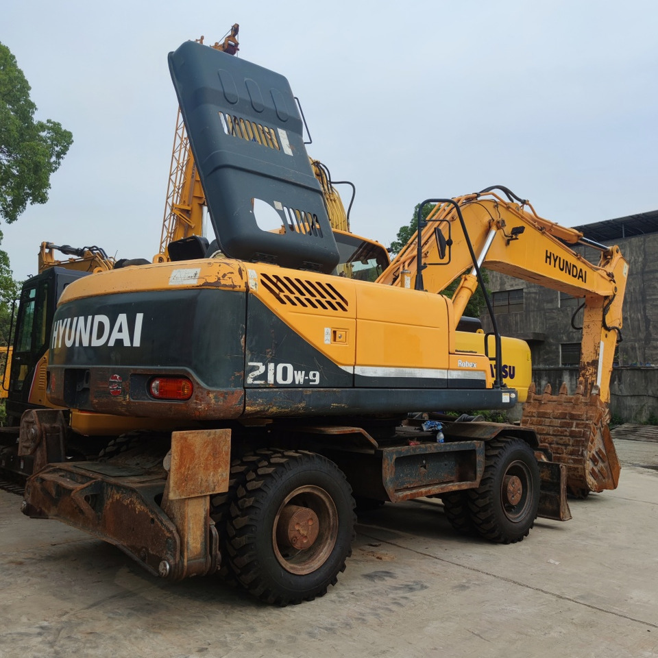 Hyundai 210w-9 wheel excavator - Колёсный экскаватор: фото 1 Hyundai 210w-9 wheel excavator - Колёсный экскаватор: фото 1