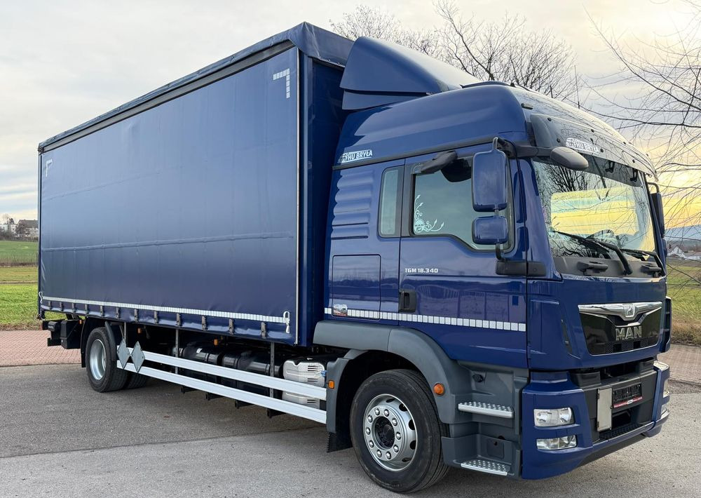 MAN TGM 18.340 / FIRANKA / SPROWADZONY / 9100 ŁADOWNOŚĆ / 18 PALET / E6 / WINDA / - Тентованный грузовик: фото 1 MAN TGM 18.340 / FIRANKA / SPROWADZONY / 9100 ŁADOWNOŚĆ / 18 PALET / E6 / WINDA / - Тентованный грузовик: фото 1