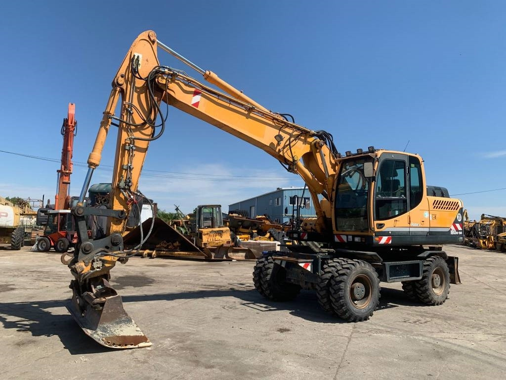 Hyundai Robex 180 W-9 A - Колёсный экскаватор: фото 1 Hyundai Robex 180 W-9 A - Колёсный экскаватор: фото 1