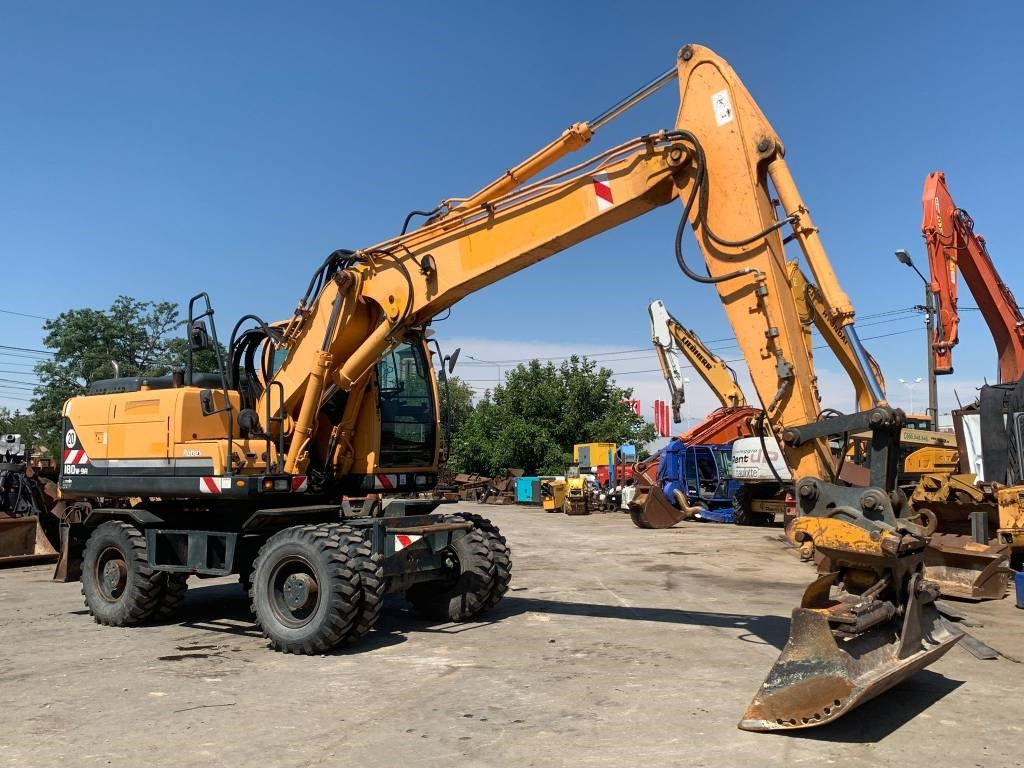 Hyundai Robex 180 W-9 A - Колёсный экскаватор: фото 5 Hyundai Robex 180 W-9 A - Колёсный экскаватор: фото 5