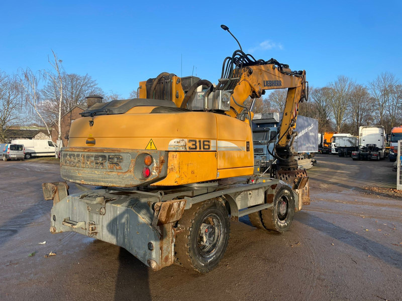 Liebherr A 316 - Колёсный экскаватор: фото 3 Liebherr A 316 - Колёсный экскаватор: фото 3