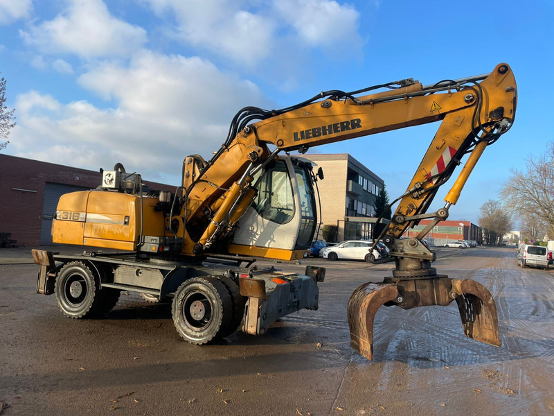 Liebherr A 316 - Колёсный экскаватор: фото 1 Liebherr A 316 - Колёсный экскаватор: фото 1