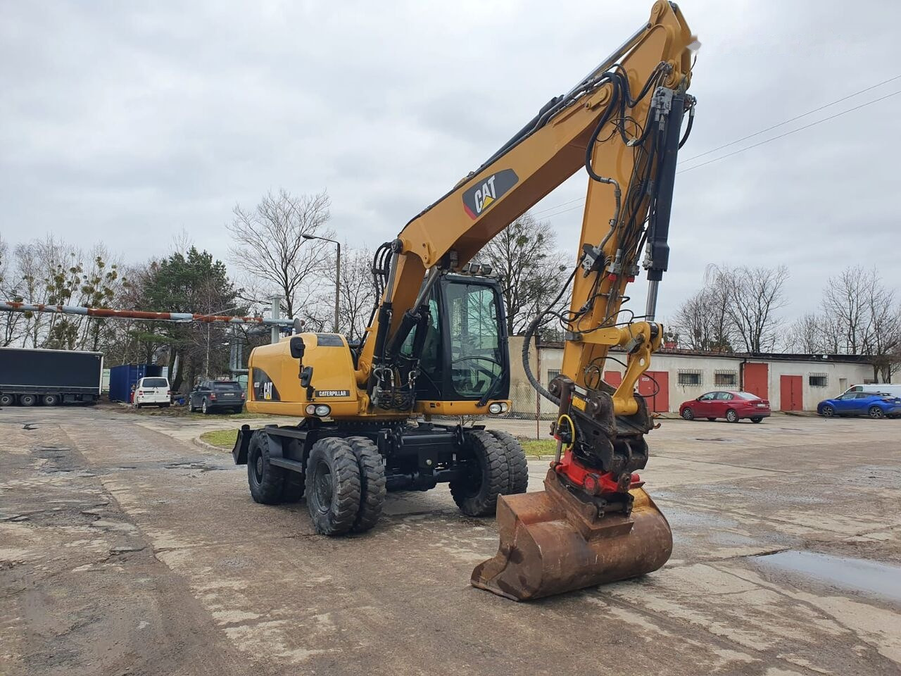Caterpillar M 313 D Tiltrotator - Колёсный экскаватор: фото 5 Caterpillar M 313 D Tiltrotator - Колёсный экскаватор: фото 5