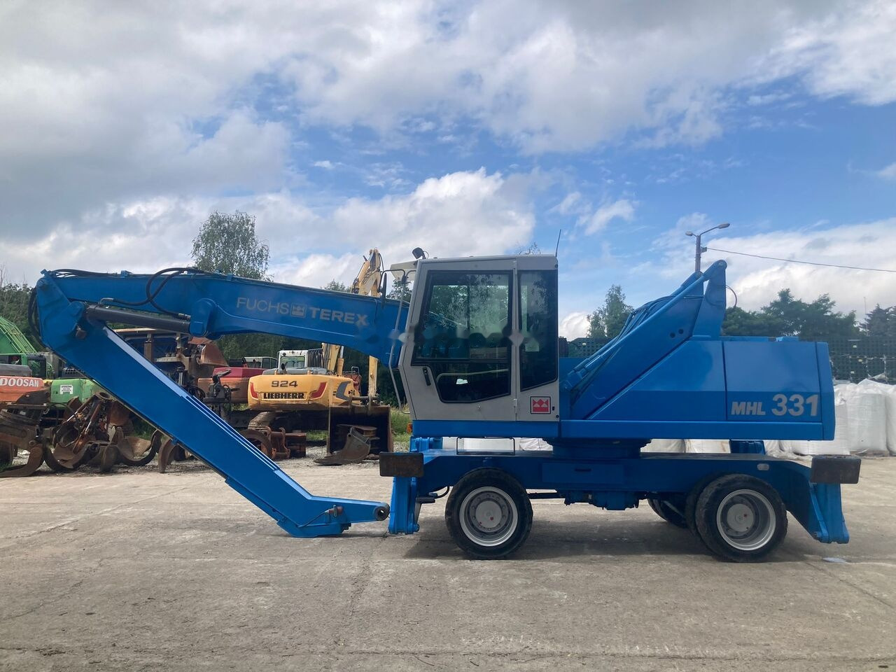 Fuchs MHL 331 C with Generator - Перегружатель: фото 1 Fuchs MHL 331 C with Generator - Перегружатель: фото 1