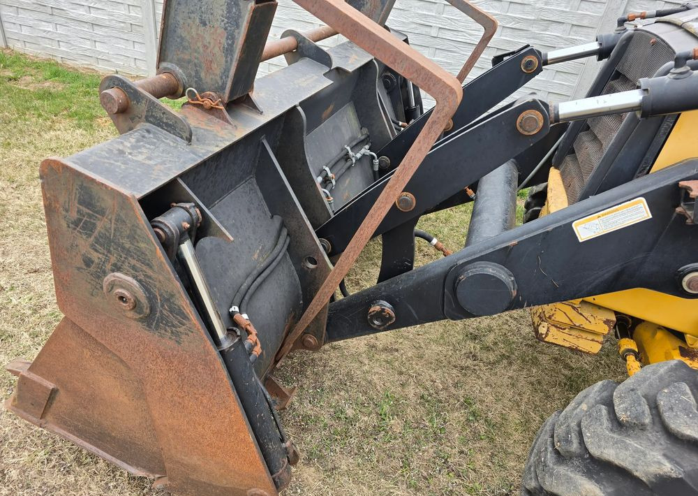 Caterpillar - Экскаватор-погрузчик: фото 5 Caterpillar - Экскаватор-погрузчик: фото 5
