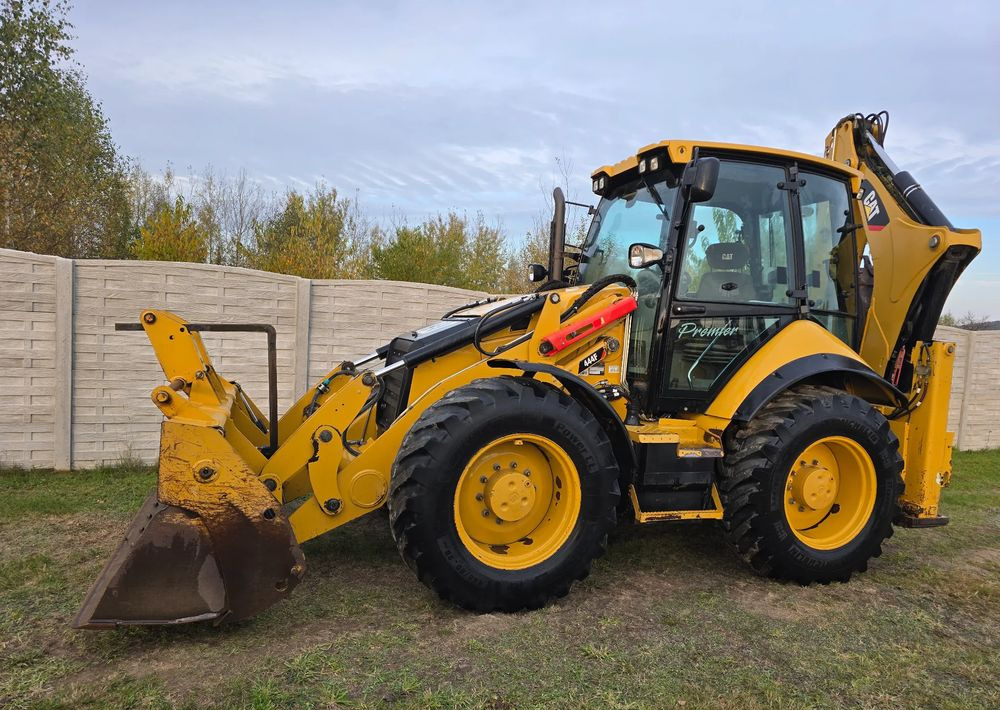 Caterpillar - Экскаватор-погрузчик: фото 1 Caterpillar - Экскаватор-погрузчик: фото 1