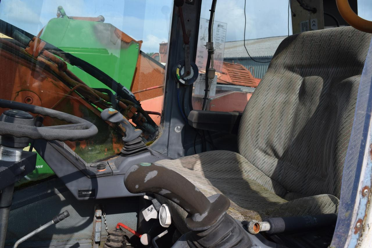 Atlas 1404 M - Колёсный экскаватор: фото 3 Atlas 1404 M - Колёсный экскаватор: фото 3