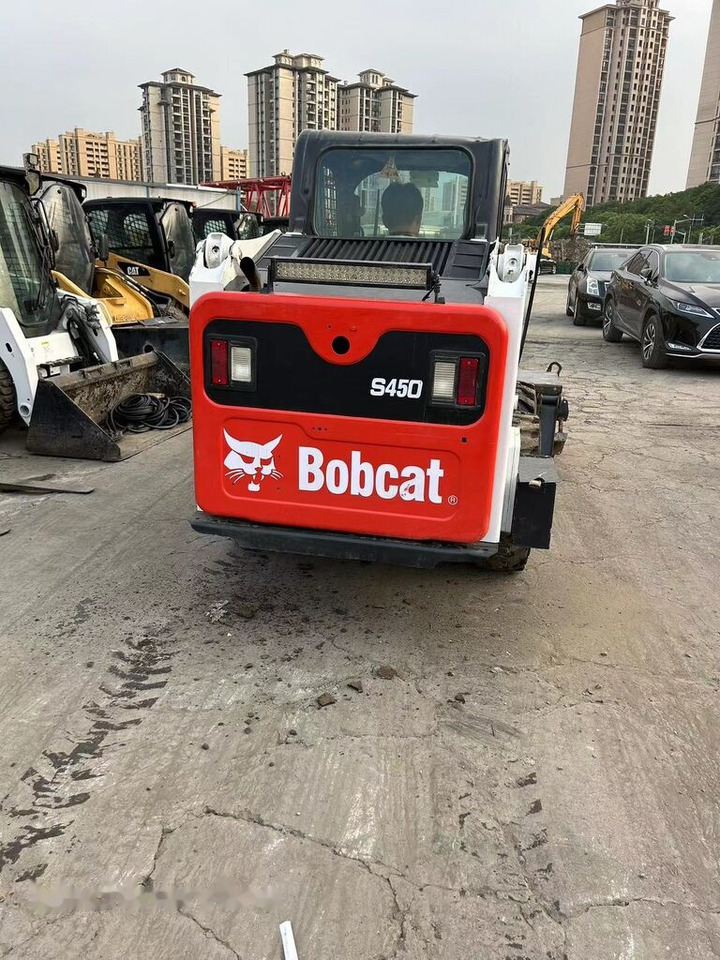 Bobcat S450 - Мини-погрузчик с бортовым поворотом: фото 1 Bobcat S450 - Мини-погрузчик с бортовым поворотом: фото 1