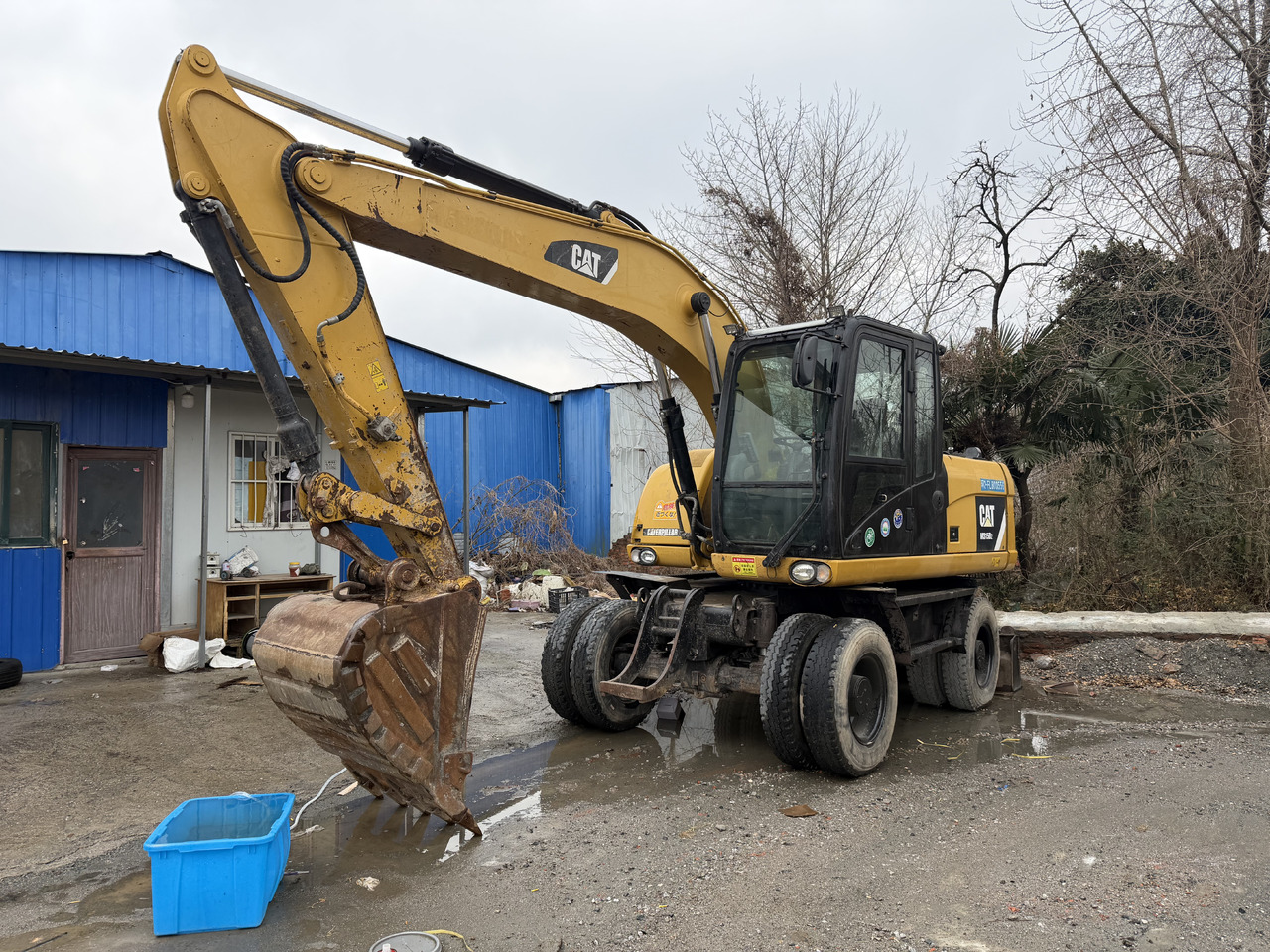 CAT M312D2 - Колёсный экскаватор: фото 1 CAT M312D2 - Колёсный экскаватор: фото 1