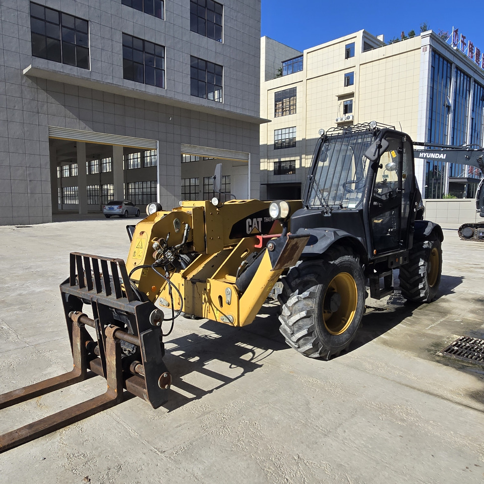 CATERPILLAR TH414 - Телескопический подъемник: фото 5 CATERPILLAR TH414 - Телескопический подъемник: фото 5