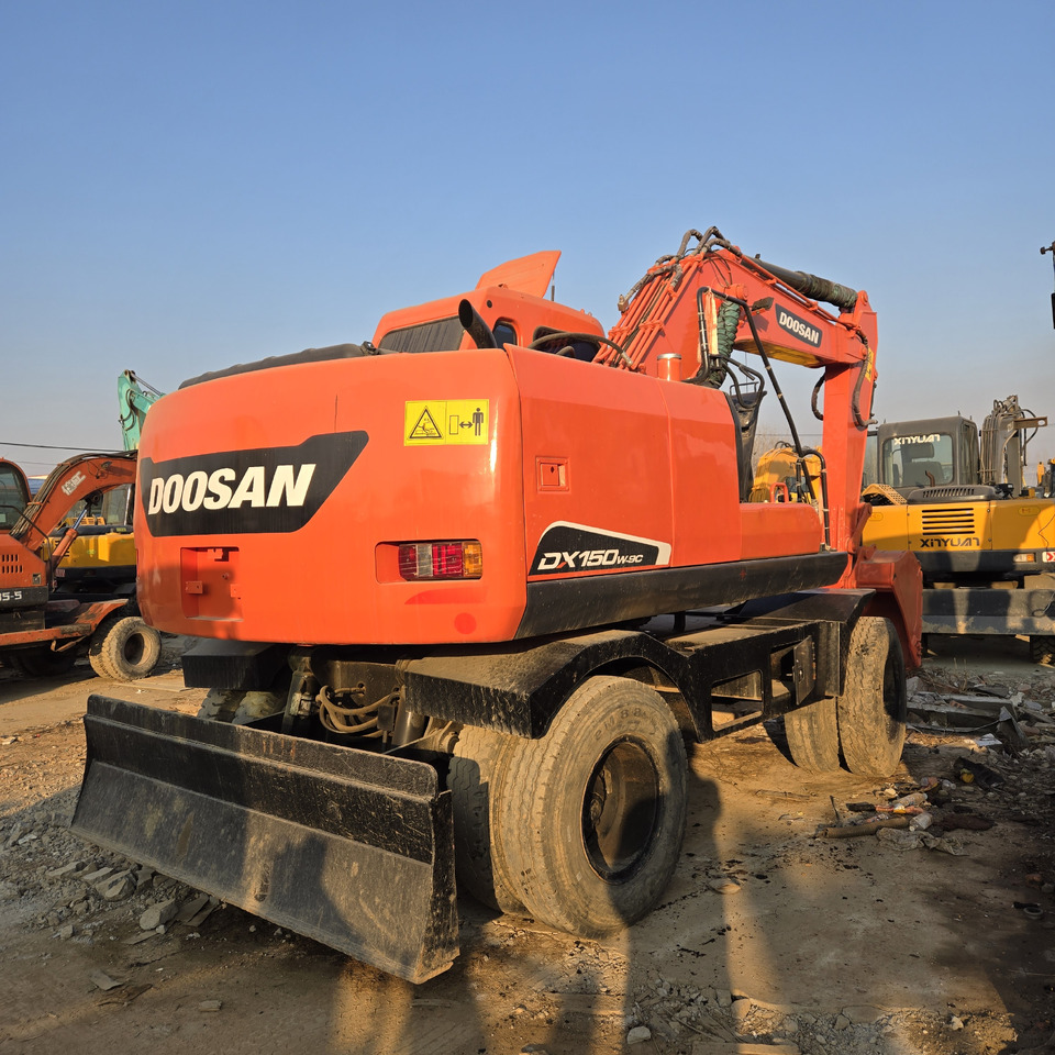 Doosan DX150W-9C - Колёсный экскаватор: фото 5 Doosan DX150W-9C - Колёсный экскаватор: фото 5