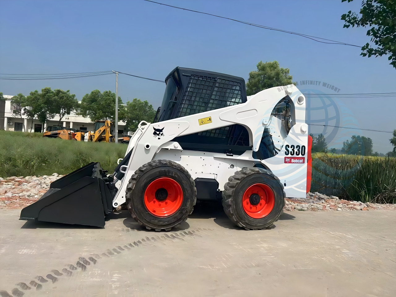 BOBCAT 330 - Мини-погрузчик с бортовым поворотом: фото 2 BOBCAT 330 - Мини-погрузчик с бортовым поворотом: фото 2