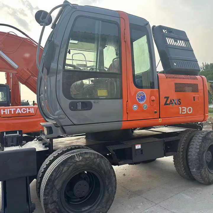 Hot Sale! Used Hitachi ZX130 Wheel Excavator |Excellent Condition| Best Price | Perfect for Construction & Road Projects - Колёсный экскаватор: фото 1 Hot Sale! Used Hitachi ZX130 Wheel Excavator |Excellent Condition| Best Price | Perfect for Construction & Road Projects - Колёсный экскаватор: фото 1