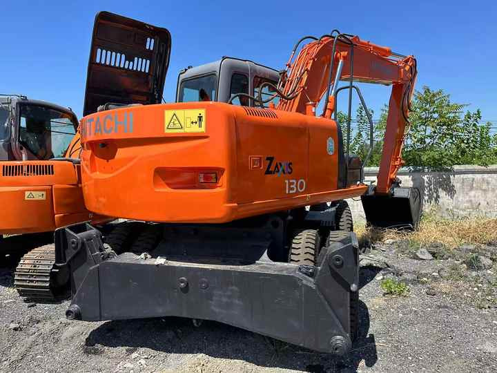 Used Wheel Excavator Hitachi ZX 130W Made in Japan 13ton Hitachi Zx130w Wheel Excavator Price Used Hitachi Zx130 Excavator SALE - Колёсный экскаватор: фото 2 Used Wheel Excavator Hitachi ZX 130W Made in Japan 13ton Hitachi Zx130w Wheel Excavator Price Used Hitachi Zx130 Excavator SALE - Колёсный экскаватор: фото 2