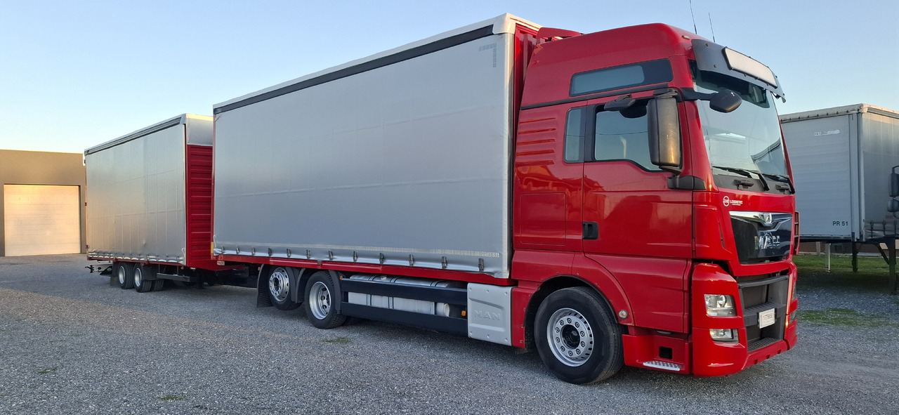 MAN TGX 26.440 E6 + SCHMITZ - Тентованный грузовик: фото 5 MAN TGX 26.440 E6 + SCHMITZ - Тентованный грузовик: фото 5