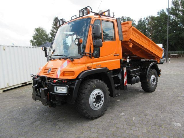 Unimog U 400, three-way tipper (DSK), long wheelbase, air - Самосвал: фото 1 Unimog U 400, three-way tipper (DSK), long wheelbase, air - Самосвал: фото 1