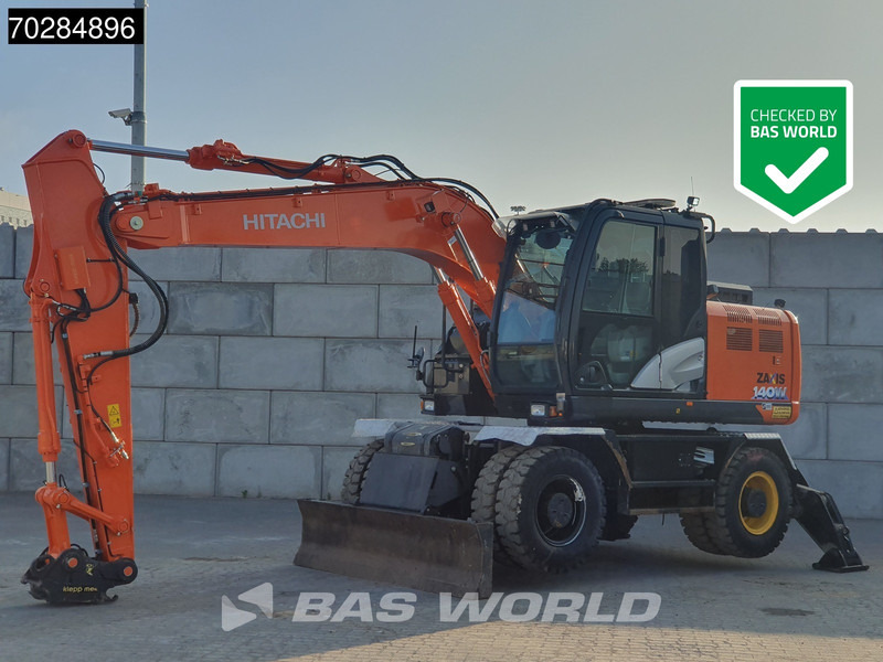 Hitachi ZX140W -6 OUTRIGGERS + BLADE - Колёсный экскаватор: фото 1 Hitachi ZX140W -6 OUTRIGGERS + BLADE - Колёсный экскаватор: фото 1