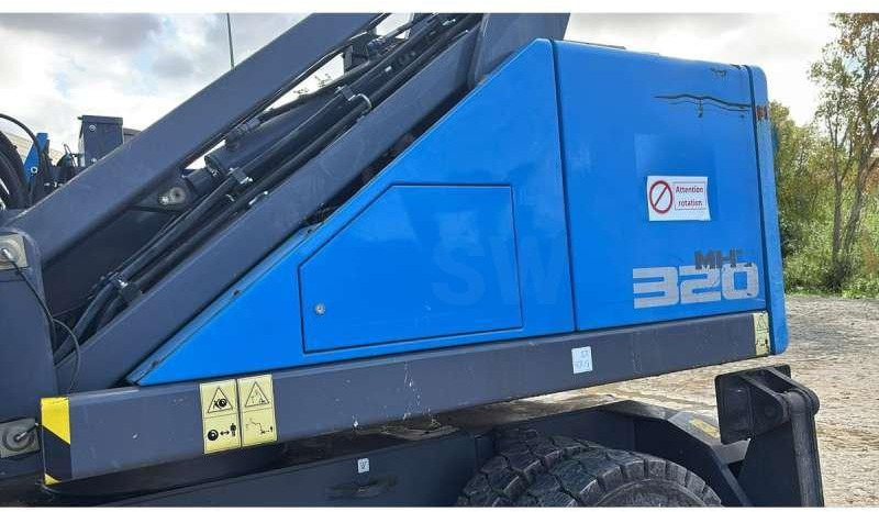 Fuchs MHL320F - Перегружатель: фото 3 Fuchs MHL320F - Перегружатель: фото 3