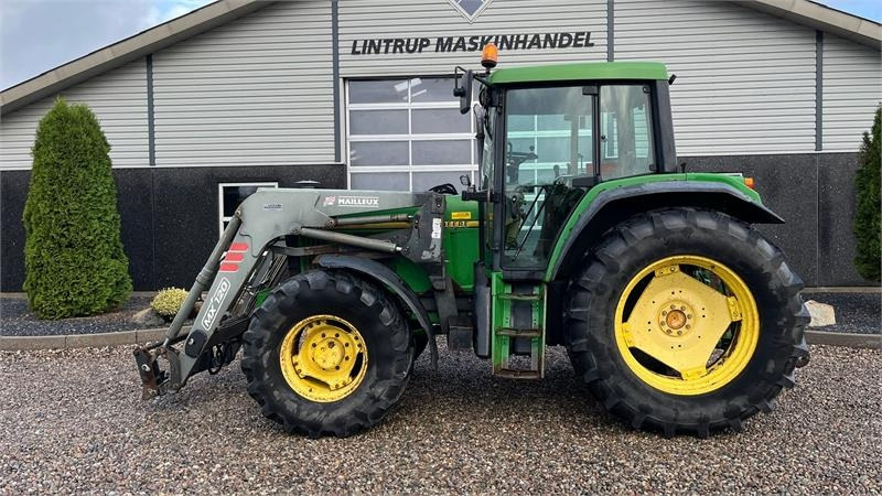 John Deere 6506 Med frontlæsser og vendegear ved rattet - Трактор: фото 1 John Deere 6506 Med frontlæsser og vendegear ved rattet - Трактор: фото 1
