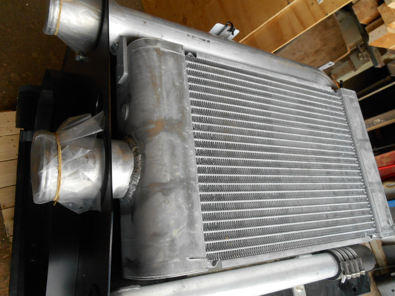 New Holland 84487933 - Интеркулер для Строительной техники: фото 2 New Holland 84487933 - Интеркулер для Строительной техники: фото 2