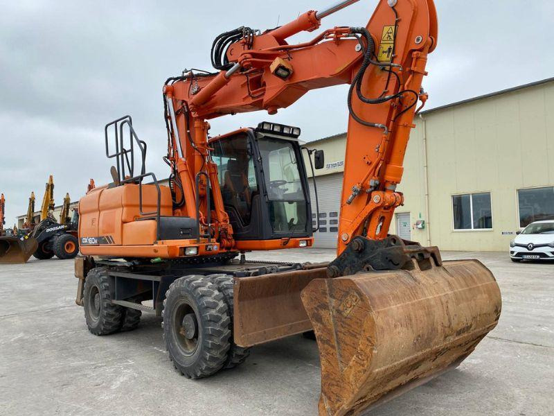 Doosan DX160 - Колёсный экскаватор: фото 1 Doosan DX160 - Колёсный экскаватор: фото 1