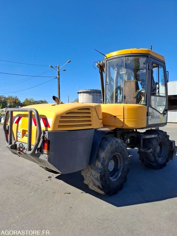 Pelle sur pneus MECALAC 12MTX - N° série 42770 - 2014 - 11400 heures - Экскаватор: фото 1 Pelle sur pneus MECALAC 12MTX - N° série 42770 - 2014 - 11400 heures - Экскаватор: фото 1
