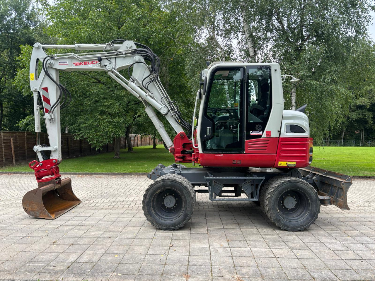 TAKEUCHI TB 295 W - Колёсный экскаватор: фото 1 TAKEUCHI TB 295 W - Колёсный экскаватор: фото 1