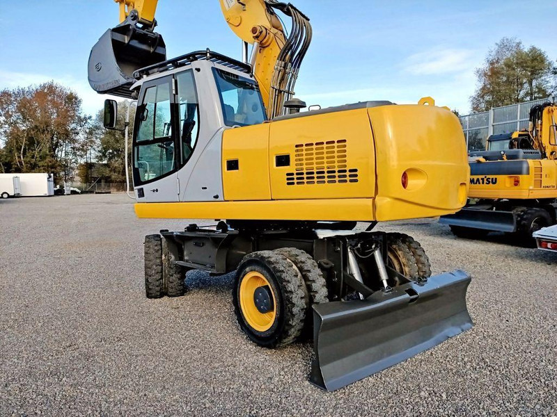 New Holland WE 190 - Колёсный экскаватор: фото 3 New Holland WE 190 - Колёсный экскаватор: фото 3