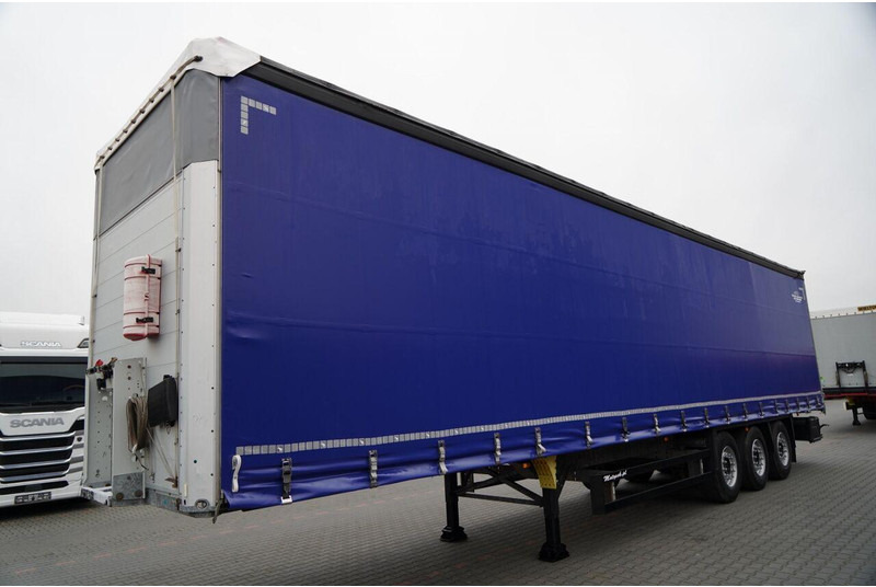 Schmitz Cargobull FIRANKA / STANDARD / 2 OSIE PODNOSZONE - Тентованный полуприцеп: фото 4 Schmitz Cargobull FIRANKA / STANDARD / 2 OSIE PODNOSZONE - Тентованный полуприцеп: фото 4